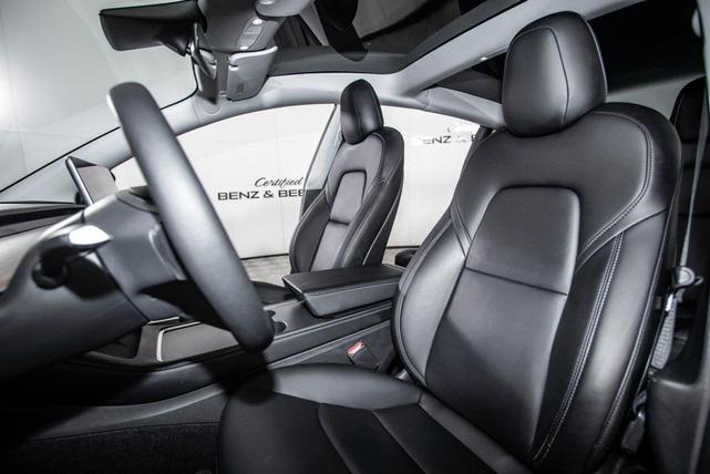 Photo of 2022 Solid Black Tesla Model 3