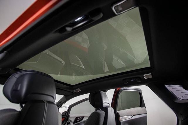 Photo of 2025 Monarch Orange Cadillac OPTIQ