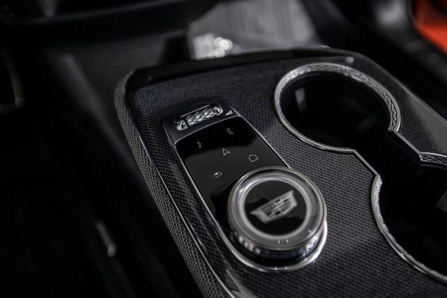 Photo of 2025 Monarch Orange Cadillac OPTIQ