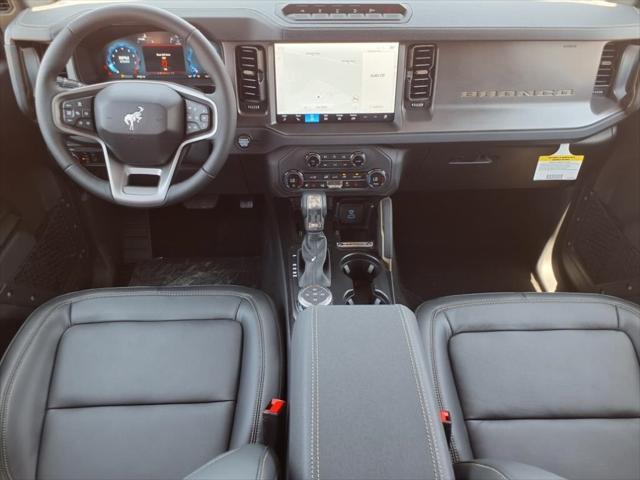 Photo of 2025 Azure Gray MET TRI-Coat Ford Bronco