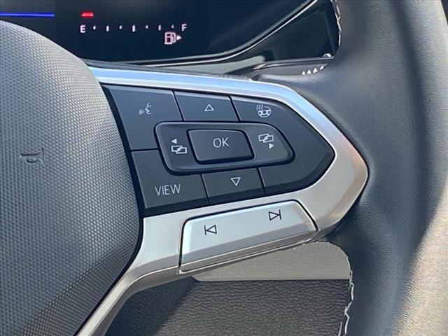 Photo of 2023 Dusk Blue Metallic Volkswagen Taos