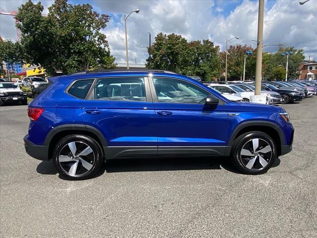Photo of 2023 Dusk Blue Metallic Volkswagen Taos