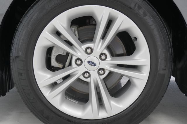 Photo of 2018 Magnetic Metallic Ford Taurus