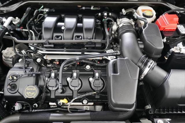 Photo of 2018 Magnetic Metallic Ford Taurus