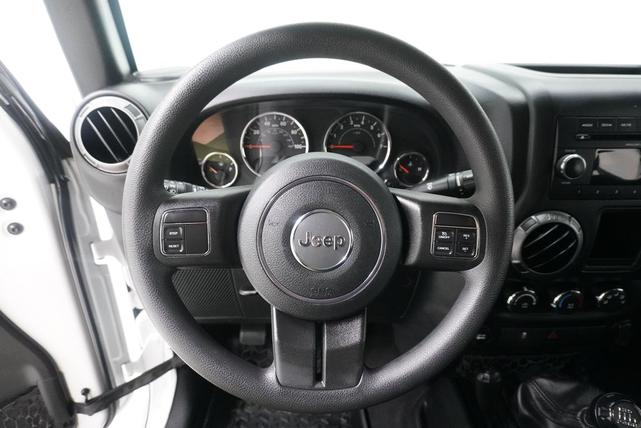 Photo of 2018 Bright White Clearcoat Jeep Wrangler JK