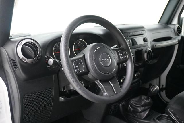Photo of 2018 Bright White Clearcoat Jeep Wrangler JK