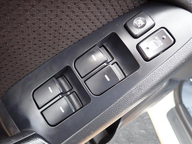 Photo of 2011 Bright Silver Metallic Kia Forte
