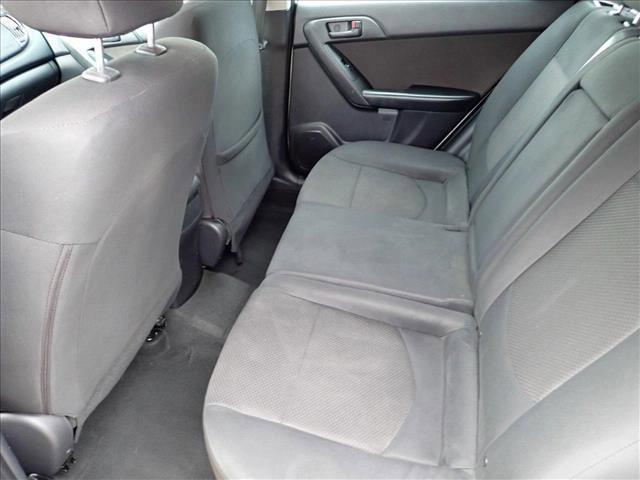 Photo of 2011 Bright Silver Metallic Kia Forte