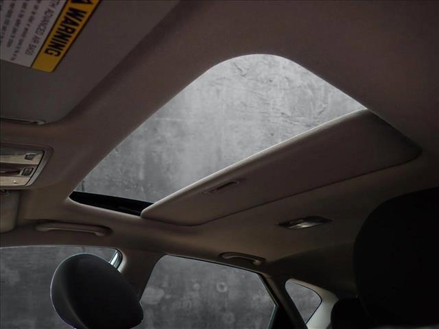 Photo of 2011 Bright Silver Metallic Kia Forte