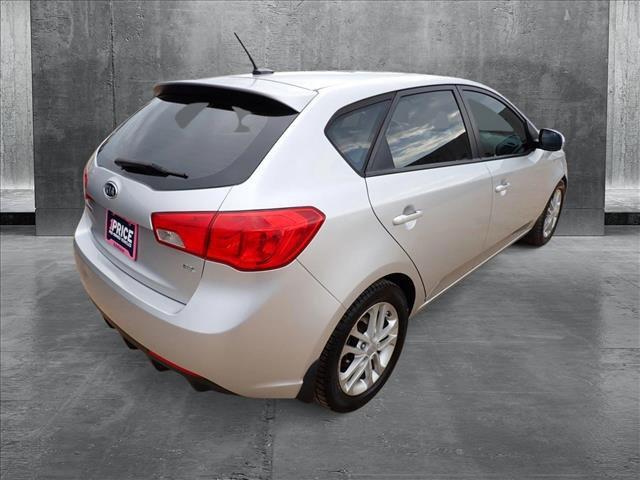 Photo of 2011 Bright Silver Metallic Kia Forte