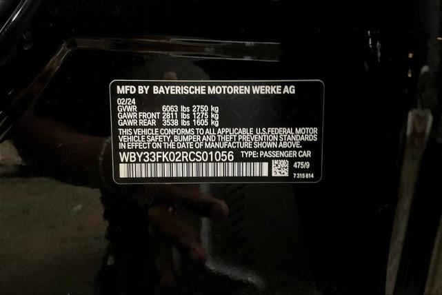 Photo of 2024 Black Sapphire Metallic BMW i5