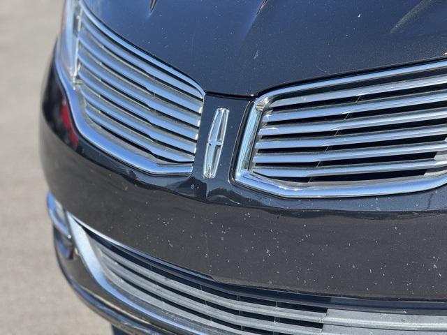 Photo of 2015 Black Tie Lincoln MKZ