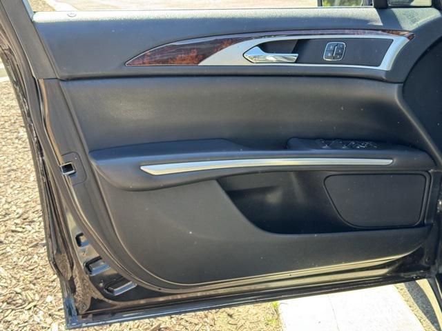 Photo of 2015 Black Tie Lincoln MKZ