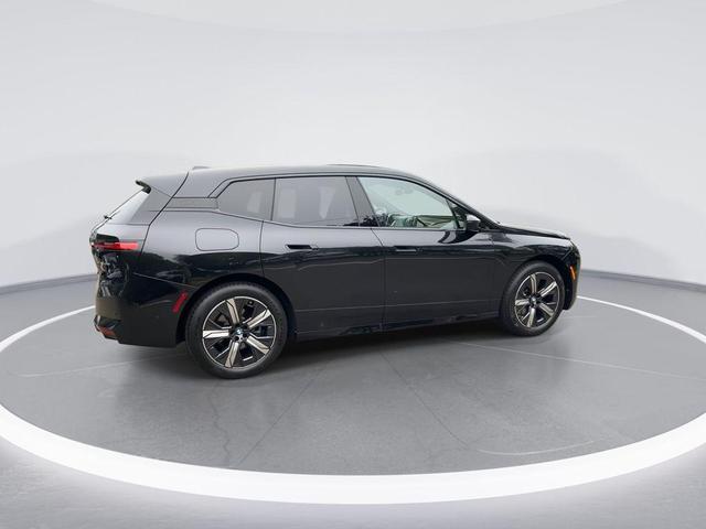 Photo of 2026 Black Sapphire Metallic BMW iX