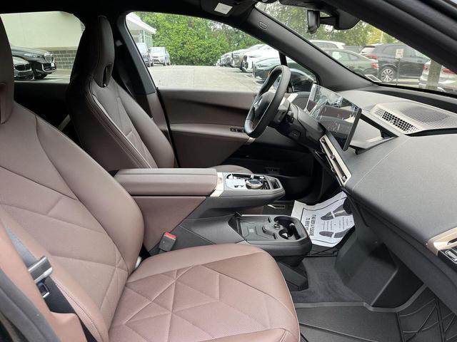 Photo of 2026 Black Sapphire Metallic BMW iX