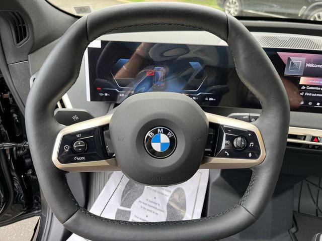 Photo of 2026 Black Sapphire Metallic BMW iX