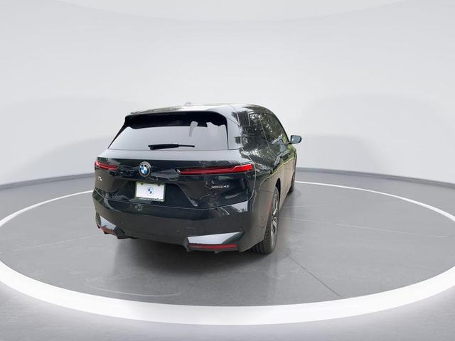 Photo of 2026 Black Sapphire Metallic BMW iX