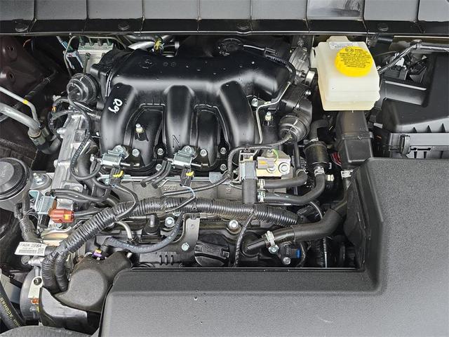 Photo of 2025 Scarlet Ember Tintcoat Nissan Pathfinder