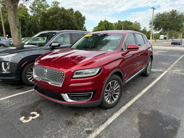 Photo of 2019 Ruby Red Metallic Tinted Clearcoat Lincoln Nautilus