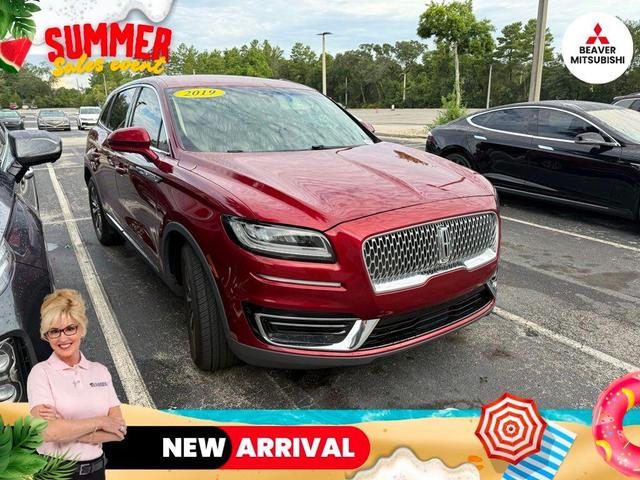 Photo of 2019 Ruby Red Metallic Tinted Clearcoat Lincoln Nautilus