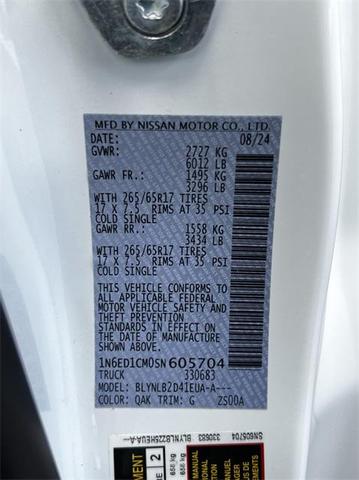 Photo of 2025 Glacier White Nissan Frontier