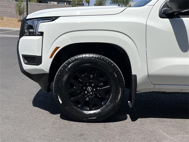 Photo of 2025 Glacier White Nissan Frontier