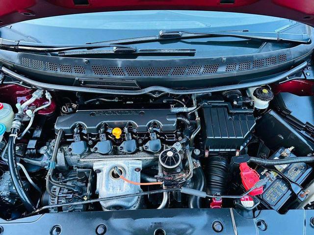Photo of 2009 Tango Red Pearl Honda Civic