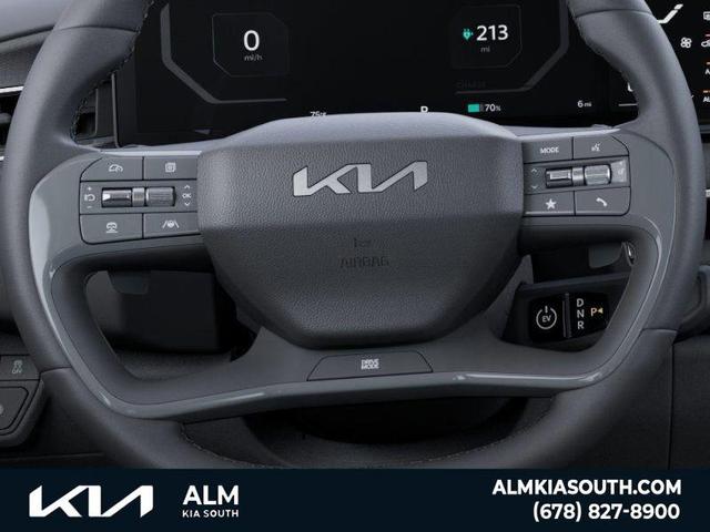 Photo of 2026 Ivory Silver Kia EV9