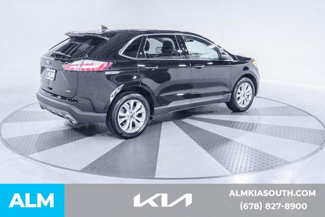 Photo of 2024 AGATE BLACK METALLIC Ford Edge
