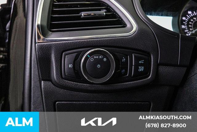 Photo of 2024 AGATE BLACK METALLIC Ford Edge