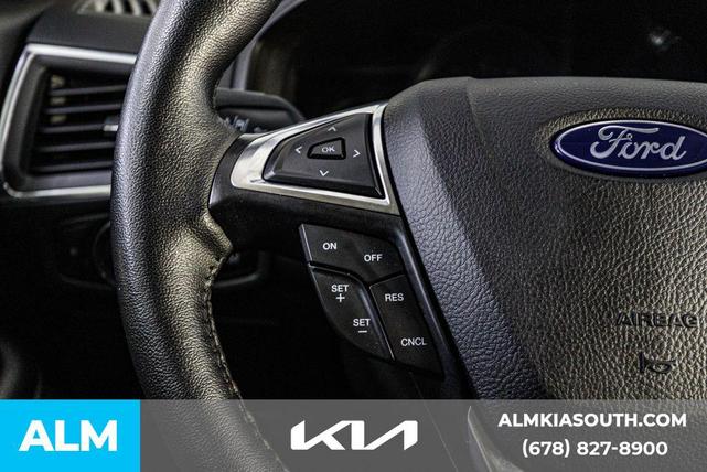 Photo of 2024 AGATE BLACK METALLIC Ford Edge
