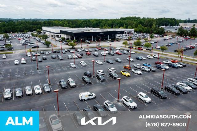 Photo of 2024 Lakeshore Blue Metallic Chevrolet Malibu