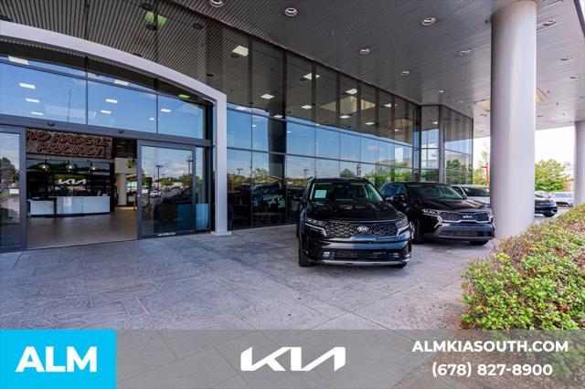 Photo of 2024 Lakeshore Blue Metallic Chevrolet Malibu