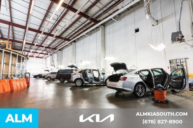 Photo of 2024 Lakeshore Blue Metallic Chevrolet Malibu