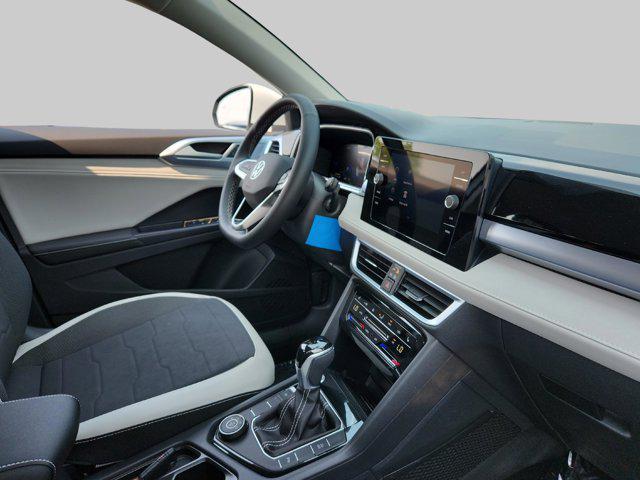 Photo of 2025 Pure White Volkswagen Taos