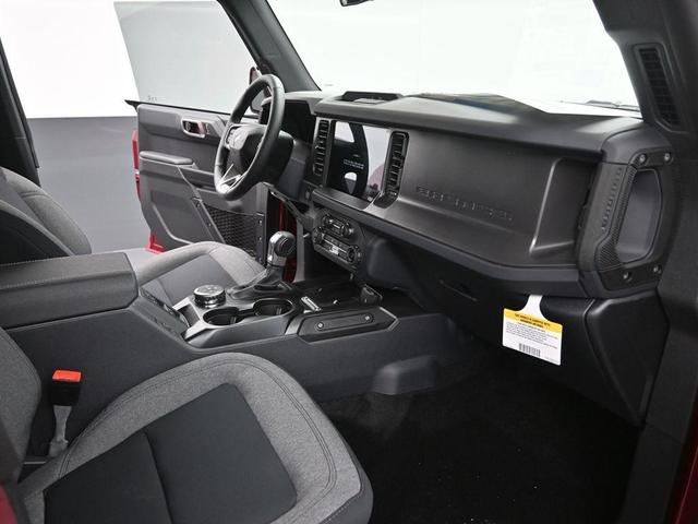 Photo of 2025 Ruby Red Metallic Tinted Clearcoat Ford Bronco