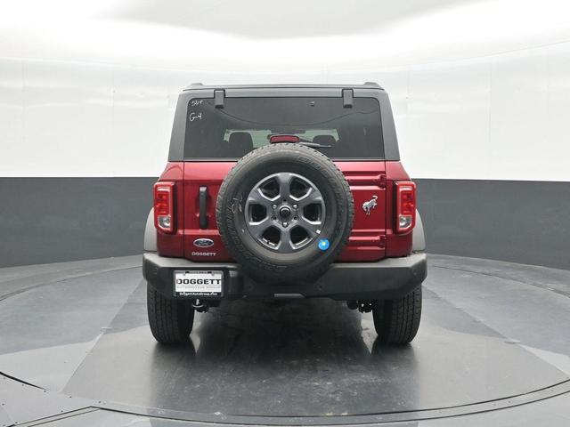 Photo of 2025 Ruby Red Metallic Tinted Clearcoat Ford Bronco