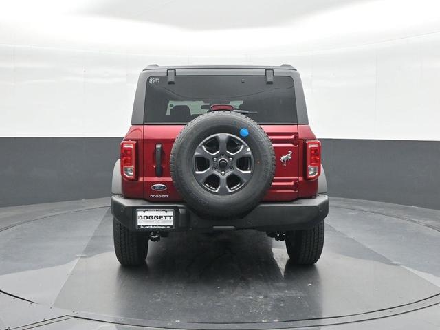 Photo of 2025 Ruby Red Metallic Tinted Clearcoat Ford Bronco