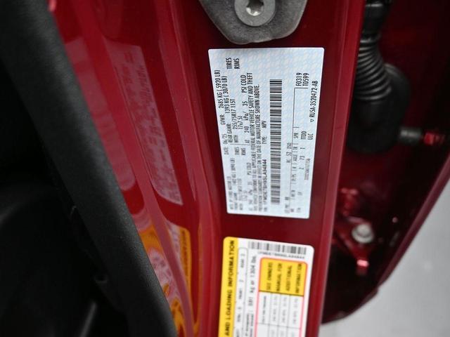 Photo of 2025 Ruby Red Metallic Tinted Clearcoat Ford Bronco