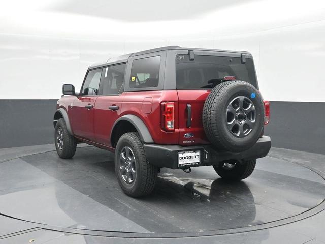 Photo of 2025 Ruby Red Metallic Tinted Clearcoat Ford Bronco