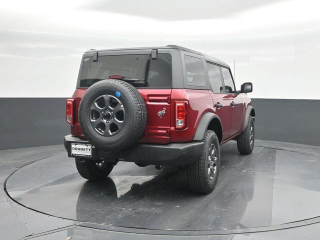 Photo of 2025 Ruby Red Metallic Tinted Clearcoat Ford Bronco