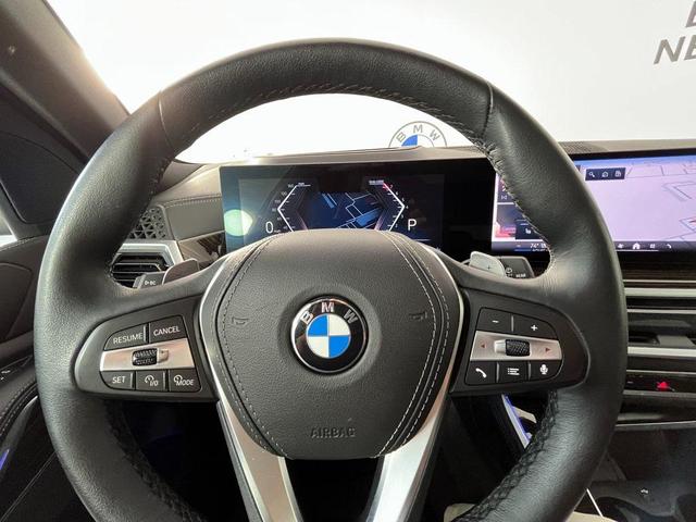Photo of 2024 Mineral White Metallic BMW X5