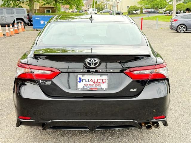 Photo of 2021 Midnight Black Metallic Toyota Camry