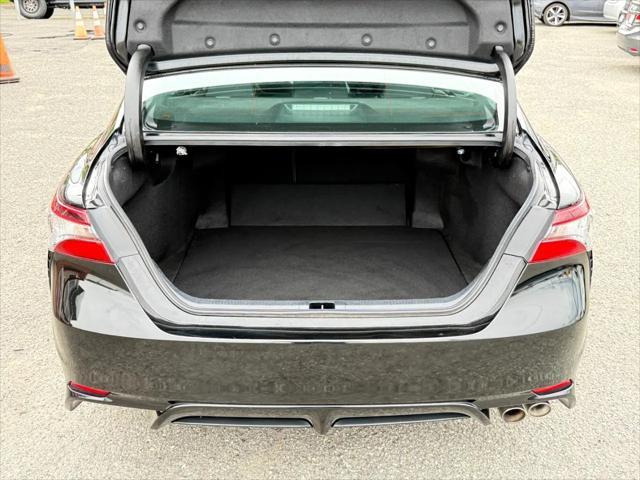 Photo of 2021 Midnight Black Metallic Toyota Camry
