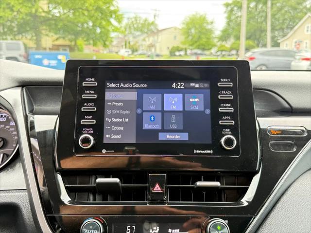 Photo of 2021 Midnight Black Metallic Toyota Camry