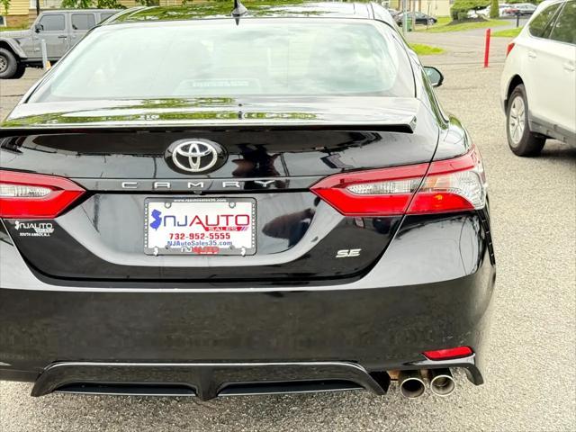 Photo of 2021 Midnight Black Metallic Toyota Camry
