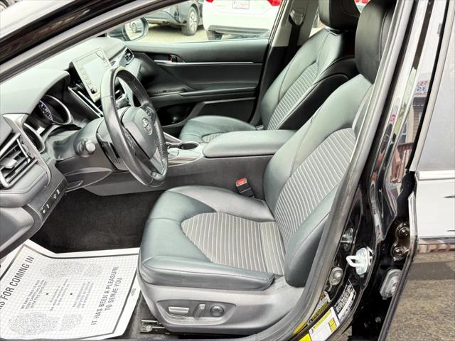 Photo of 2021 Midnight Black Metallic Toyota Camry