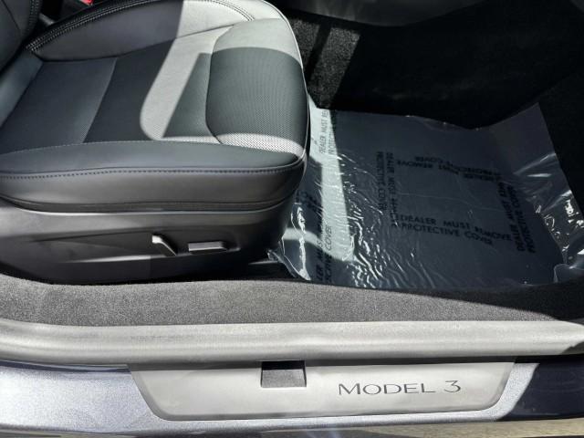 Photo of 2024 Black Tesla Model 3