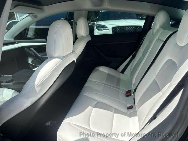 Photo of 2022 Solid Black Tesla Model 3