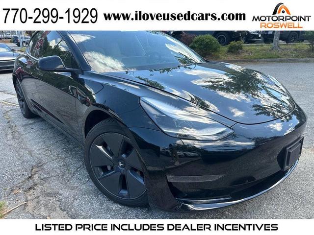 Photo of 2022 Solid Black Tesla Model 3